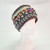 Headband Flower Maroon
Woolen items with floral embroidery handmade in Nepal.

Inside of all are lined with soft fleece.

Free size. As these are handmade, sizing may vary.

The main background colour will be as per images however the colour of embroidery/stitching may vary.