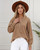 Mutig Top Mocha

Button up at front
Long sleeves
Relaxed fit
Viscose blend
