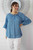 Sundrenched Marrakesh Top Aqua
Classic flat rayon style Top in "Sierra" print with small bell arms and round neckline with tassel trims and tie. Available in 2 sizes.

                             MEASUREMENTS

                                       10-14	16-20
LENGTH	               64cm	66cm
BODY	                       62cm	70cm
SLEEVE LENGTH     46cm	47cm
