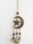 Bells Star & Cresent Moon

Brass with maroon beads
Approx 6cm x 12cm
