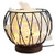 Selenite Caged Lamp

Selenite 'Stalagmite' Caged Fire Bowl Comes with cord & Globe Selenite is a calm stone that In stills deep peace and is excellent for meditation or spiritual work. Selenite is a type of gypsum crystal that is often translucent or a shimmering opaque. Our selenite products come from the ancient sea beds in Morocco. The purest translucent white selenite is said to have an ethereal quality, inhabiting the space between light and matter. The very fine vibration of selenite brings clarity of mind. Its high frequency vibration qualities link it to the light body, helping to anchor it to the earths vibrations. This versatile and often underrated crystal has properties that make it truly unique for spiritual and metaphysical purposes