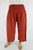 SD Bara 3/4 Pant Rust

Elastic waist with splits at sides.
one size fits 10-16