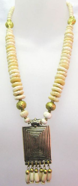 NECKLACE BRASS PENDANT CREAM
 Absolutely stunning Tibetan necklace. Brass rectangle pendant on resin necklace