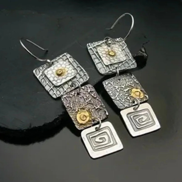 Geometric Tribal Earring
These earrings offer a unique, handcrafted charm.
Are a stylish accessory for any fashion-forward individual.
They add a vintage touch to any outfit.
Crafted from durable zinc alloy, these earrings offer lasting shine and a lightweight feel.