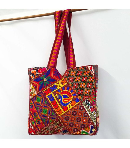 Embroidered Patchwork Bag Red

Cotton patchwork bags with embroidery handmade in India. No 2 bags are exactly alike - each has it's own unique patchwork design, adding to the charm and individuality of each piece.

   - Height: 32cm approx
   - Width: 31cm approx
   - Depth: 13cm approx