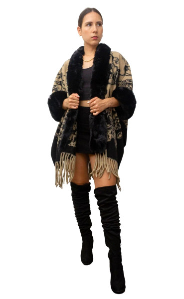 Wishstone Opera Coat

Elevate your winter wardrobe with this luxurious wool poncho. 
Designed with soft faux fur trim and elegant fringe detailing, this piece offers both warmth and sophistication. The relaxed silhouette allows for easy layering, making it perfect for both casual outings and special occasions. 
A timeless statement piece that instantly upgrades any look. Material: Wool Polyester, Poncho / Cape Fit: Relaxed / Free size Details: Faux fur trim, fringe hem