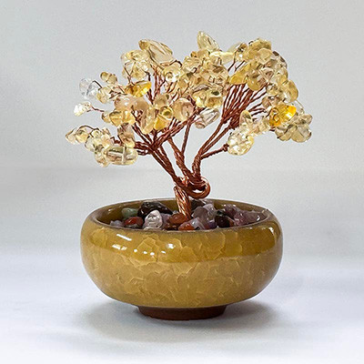 Gemstone Tree Bonsai Citrine
A Bonsai Gemstone Fortune Tree in a pot is a decorative, handcrafted Feng Shui item designed to attract wealth, positive energy, and balance.
Height & Width approx: 8x8cm. Base diameter: 6cm approx