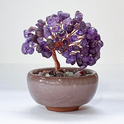 Gemstone Tree Bonsai Amethyst
A Bonsai Gemstone Fortune Tree in a pot is a decorative, handcrafted Feng Shui item designed to attract wealth, positive energy, and balance.
Height & Width approx: 8x8cm. Base diameter: 6cm approx