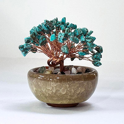 Gemstone Tree Bonsai Turquoise
A Bonsai Gemstone Fortune Tree in a pot is a decorative, handcrafted Feng Shui item designed to attract wealth, positive energy, and balance.
Height & Width approx: 8x8cm. Base diameter: 6cm approx