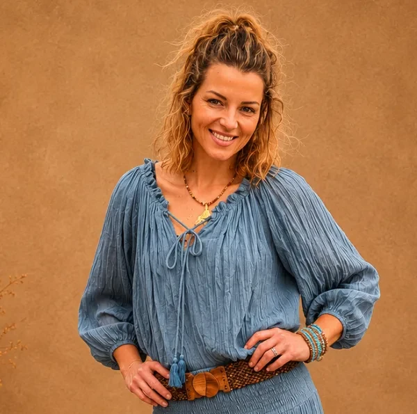 Gypsy Peasant Top Blue

Soft lightweight crinkle cotton
Adjustable tie neckline with tassel detail
Relaxed, flowing silhouette
Elastic cuff sleeves

One-size fit