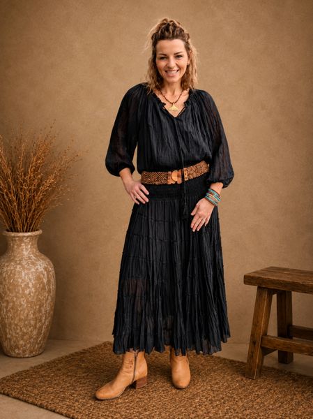 Gypsy Tiered Skirt  Black

Soft crinkle cotton texture
Comfortable shirred elastic waistband
Flowing tiered silhouette
Midi to maxi length
Easy-to-style
Relaxed bohemian fit