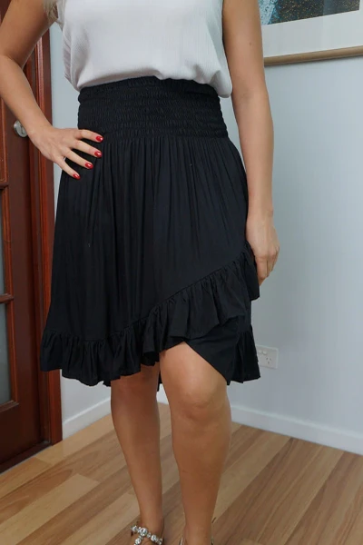 Sundrenched Ibiza Skirt Black
This rayon skirt features an elastic shirring waist, and curved frilled edging.

ONE SIZE TO FIT 10-16

