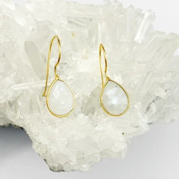 
Earring 14K Gold Plated Brass Teardrop Moonstone 
Approx 2.5x1CM

PLEASE NOTE All jewellery is crafted from brass with gold plating and a protective e-coating. To help maintain its finish and extend its lifespan, we recommend avoiding exposure to water (including showering and swimming), as well as perfumes, lotions, hairspray, and other chemicals