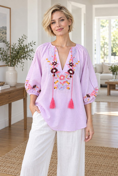 Salty Bright Embroidered Top Lilac
Gorgeous embroidery on front & arm hemline
Over sized (size down)
Tie at neck with tassel
3/4 sleeve with loose elastic
Hi low hemline
100% cotton