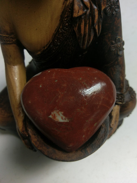 Red Jasper Heart. Choose from 7 x 6cm, 7 x 5.5cm, or 5.75 x 5cm. Gently stimulating, red jasper, assists in transmuting emotional, mental and physical pain, especially menstrual pain. It grounds energy and rectifies unjust situations. Red jasper brings to light problems before they get out of hand and provides insights into the most difficult situations. It is perfect for worry beads or stones as it calms the emotions. If you place the stone under your pillow it will help dream recall. Red jasper stimulates the base chakra and assists re-birthing. It cleans that stabilises the aura and strengthens your boundaries. This is a stone of health, strengthening and detoxifying the circulatory system, blood and liver. It dissolves blockages in the liver or bile ducts. ​Heart shaped crystal bestows love & truth to the giver & receiver. A feeling of peace & security accompanies the heart. 