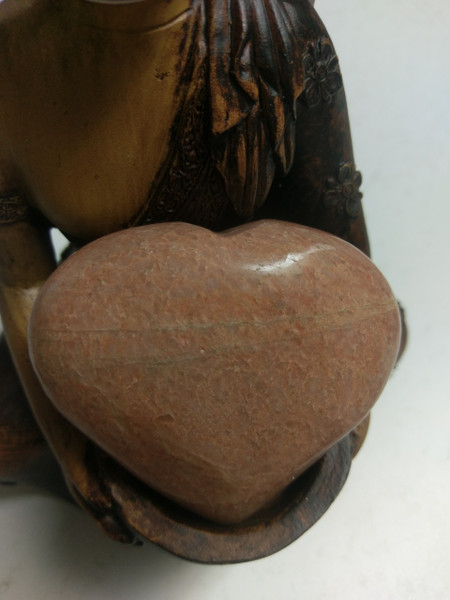 $32. Peach Aventurine Heart. Pink aventurine brings out the qualities of love, nurture, friendship, femininity, and inner strength. It works with the Higher-Heart Chakra, and can impart a wonderful sense of well-being. It can be a very calming stone that can help clear the way for an understanding of alternatives in one's life, removing any feelings of being trapped in a certain circumstance.
​Heart shaped crystal bestows love & truth to the giver & receiver. A feeling of peace & security accompanies the heart. 