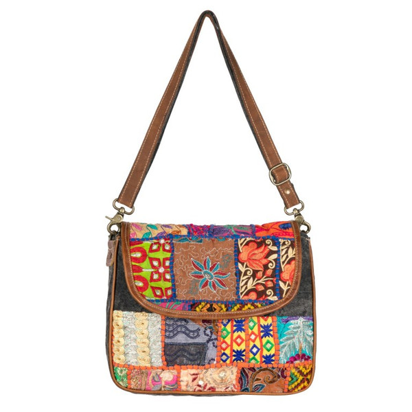 Flint Shoulder Bag

Material: Traditional Fabric & Leather
Fittings: Brass and Zinc Hardware
Dimensions: 9.5x12x3.5(in inches)
Closure: Brass Zipper
All the bags are made with natural cowhide/up-cycled canvas material and the bags might differ a bit from the picture shown.