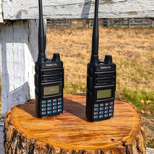 Two Radioddity GM-30s on a piece of wood.