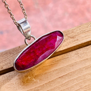 Experience the beauty of our Ruby Rose Cut Pendant Necklace, a stunning statement piece for any occasion. Experience the beauty of our Ruby Rose Cut Pendant Necklace, a stunning statement piece for any occasion.