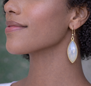 Long marquise shaped moonstone earrings featuring natural gemstones set in wire bezel