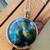 Mesmerizing Round Labradorite Pendant Necklace with cosmic fire hues. Mesmerizing Round Labradorite Pendant Necklace with cosmic fire hues.