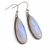 Sterling silver moonstone earrings with long pear shaped faceted gemstones and soft blue flash dangle design
