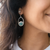 Sterling silver turquoise hoop earrings with bezel set blue gemstones, unique handmade Navajo statement earrings for women