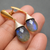 Labradorite gemstone drop earrings featuring long natural briolettes with ethereal blue to green flash