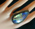 "Adjustable blue Labradorite ring in Sterling Silver, designed for comfort and style." "Adjustable blue Labradorite ring in Sterling Silver, designed for comfort and style."