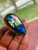 "One-size-fits-adjustable Labradorite ring in Sterling Silver, a thoughtful gift for a loved one." "One-size-fits-adjustable Labradorite ring in Sterling Silver, a thoughtful gift for a loved one."