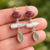 Long cascading earrings with pink rhodonite, white pearls and green prehnite, bezel set in 925 sterling silver