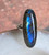 "Long Labradorite oval statement ring crafted in 925 sterling silver, radiating healing energies."