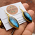 Long marquise shaped labradorite earrings featuring lightweight wire bezel dangle design