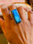 "Experience the enchanting allure of Labradorite with this adjustable rectangular ring." "Experience the enchanting allure of Labradorite with this adjustable rectangular ring."