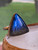 "Sterling silver Labradorite ring featuring a tringle-shaped gemstone with intense blue spectrum."