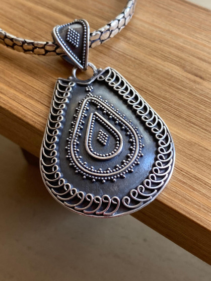 Sterling silver designer pendant handmade by earthkarmajewellery
