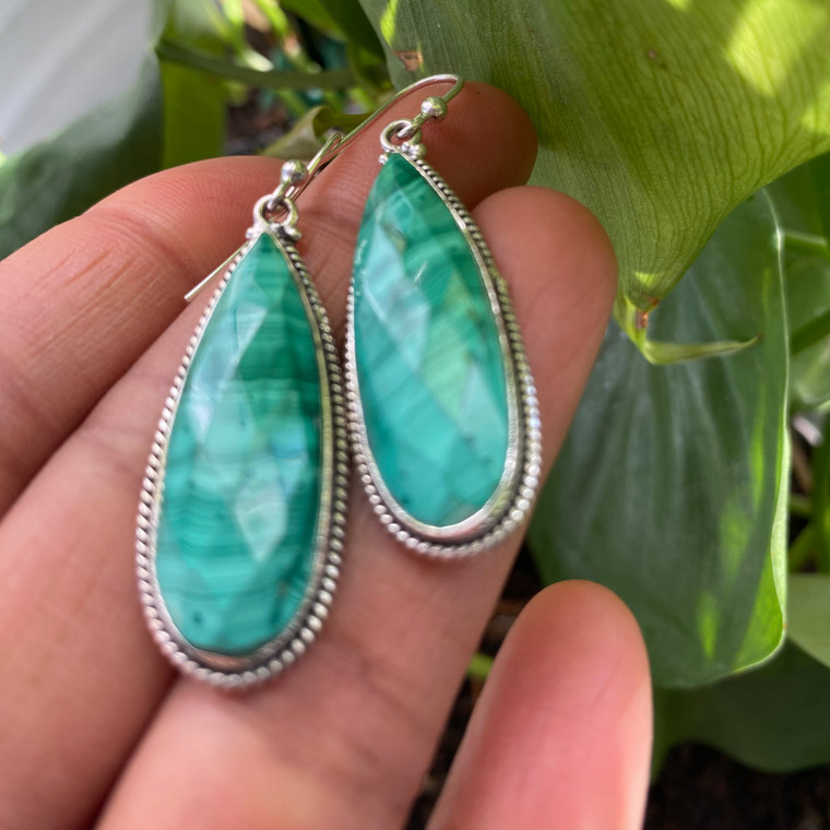 "Elevate her accessories with these Earth Karma Green Malachite teardrop earrings set in sterling silver. Ideal for Christmas, Mother's Day, or engagements. Shop now!"