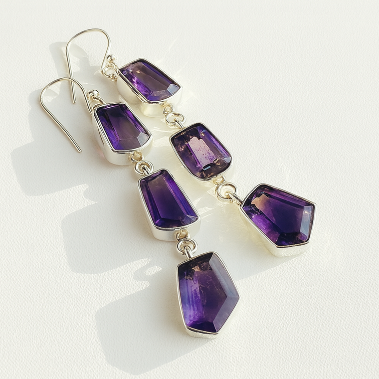 Minimalist sterling silver amethyst drop earrings featuring three asymmetrical rose-cut gemstones, artisan-made with matching crystal bracelets and rings