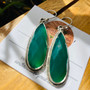 "Add a pop of color to your look with these Earth Karma Big Green earrings. Shop now and make a chic statement!"