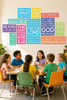 Children learning beneath Scripture memory wall decals