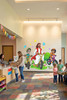 Jesus riding bikes with kids wall decal in a church children's ministry space