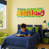 Boy reading on a bed beneath a colorful "You Can Do Anything" Philippians 4:13 wall decal in a Christian bedroom.