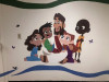 Jesus blessing children wall decal installed on classroom wall with simple painted border.