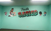 Faith Babies church nursery wall decal with Jesus and children on teal classroom wall.