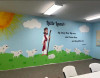 Good Shepherd wall decal with Jesus and lambs installed on church classroom wall.