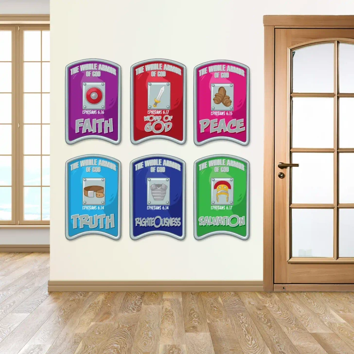 Armor of God wall decals displayed across a preschool ministry classroom wall above children's activity centers.