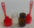 1 GRAM CLEAR GLASS & 1 GRAM AMBER GLASS BULLET JARS W/ LIDDED COLORED PLASTIC SPOON