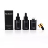 1 oz Black  Cylinder Glass Bottle with 20-400 neck finish with White Gold Bullnose Dropper