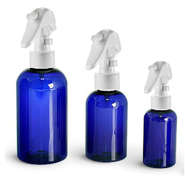 2 oz Cobalt BLUE PET Boston Round Bottle 20 neck finish w/ 20 neck White Mini Trigger Spray