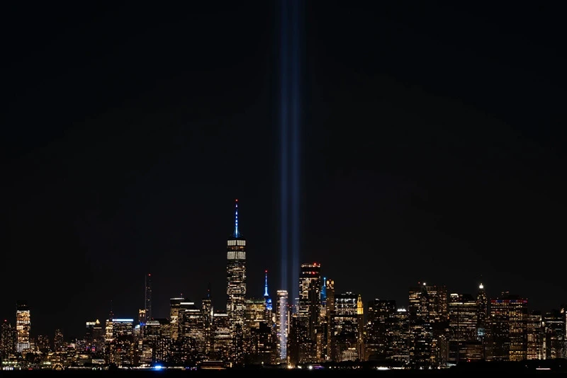Tribute in Light rising above the New York City skyline in remembrance of September 11